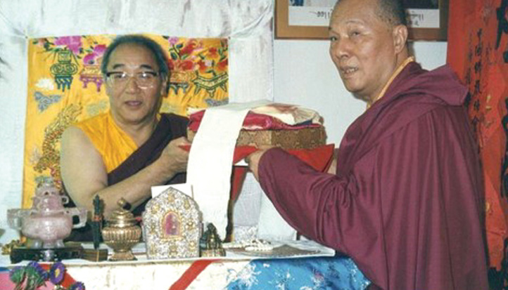 H.H. J.D. Sakya receiving offering from Lama Kan Tsao in N.Y., 1990